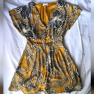 Mustard Yellow top w/ black & white florals size: M